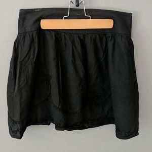 Flouncy embroidered black miniskirt